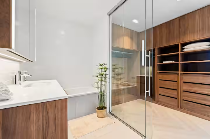 Master bathroom with bathtub and walk-in shower