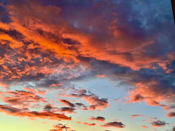 Fiery sunset sky over the Atlantic from the apartment