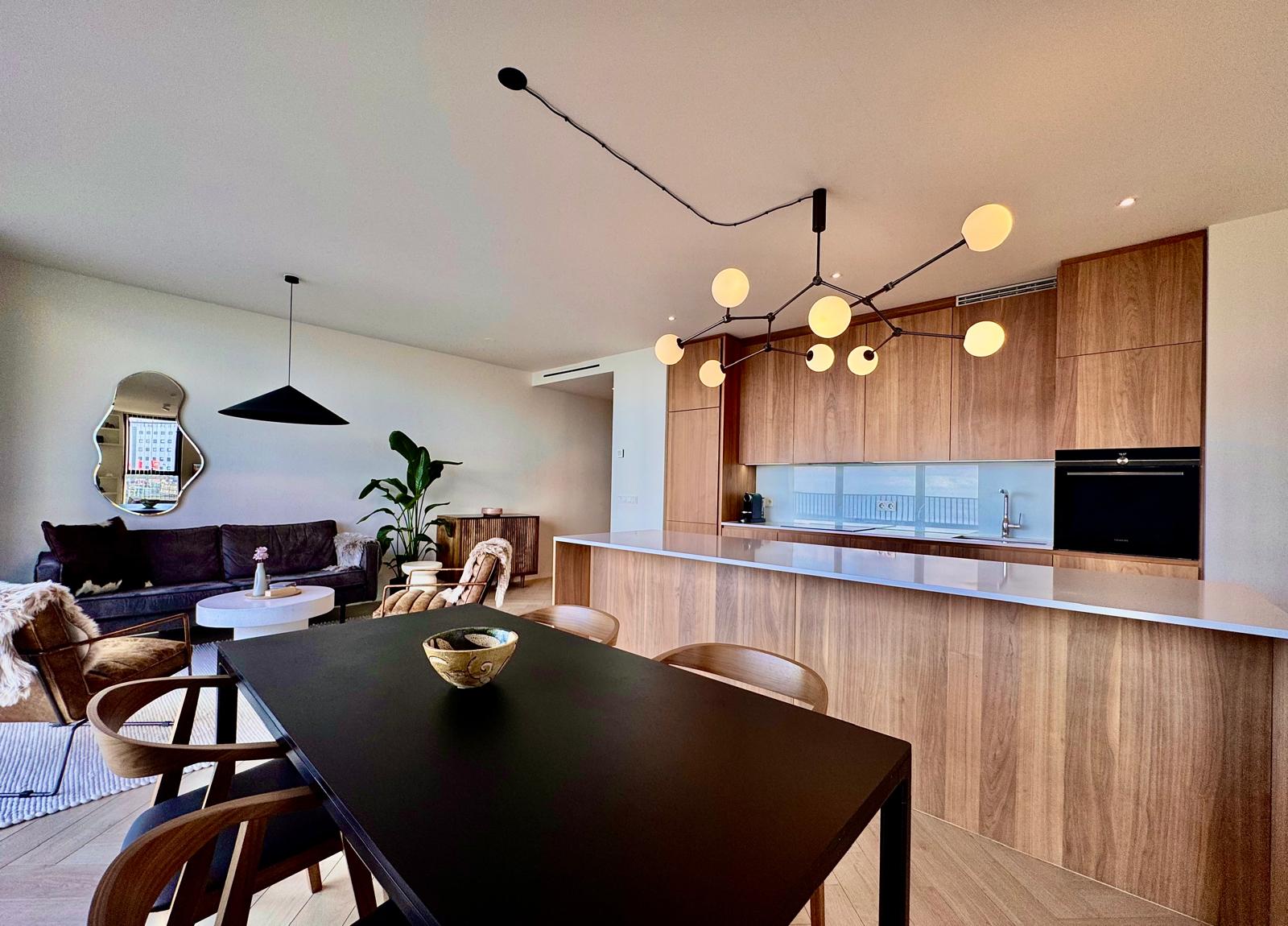 Kitchen and dining seen wide