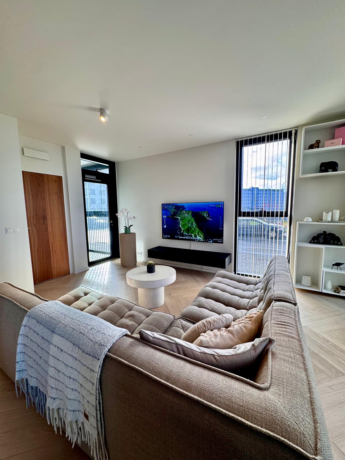 TV lounge with herringbone floors